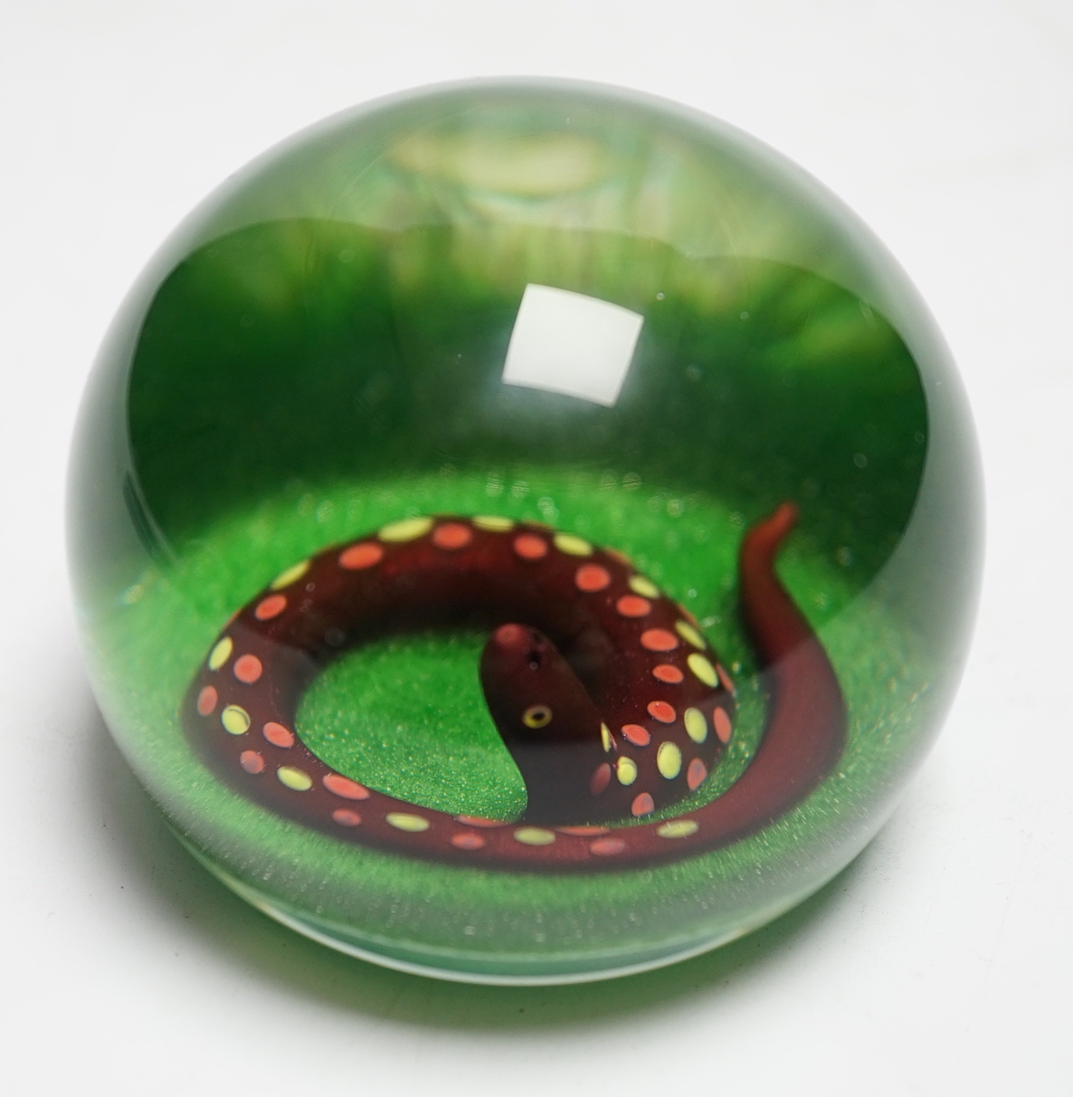 A Paul Ysart ‘aventurine snake’ glass paperweight, Harland period, ‘PY’ cane beneath, green opaque ground, 7cm